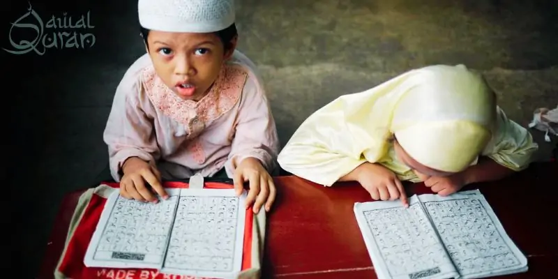 kid reading Qaida