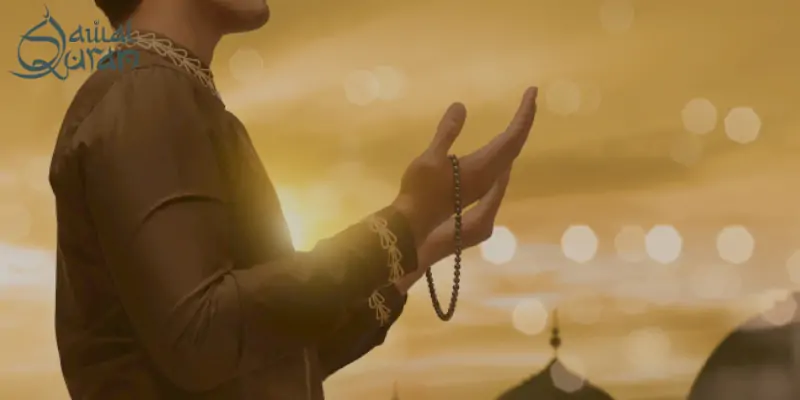 a person holding a beaded necklace.