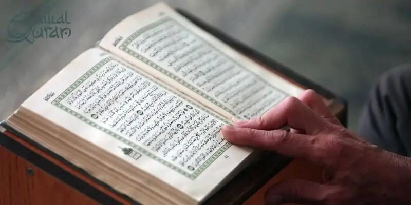 A person reading the Quran.