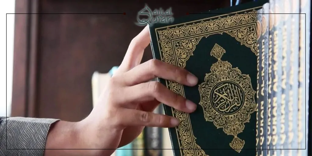 The Quran, a holy book for Muslims, is open and displayed on a wooden stand, symbolizing faith and devotion.