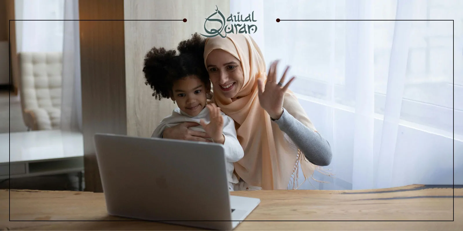 A woman and a child are seated in front of a laptop, focused on the screen.